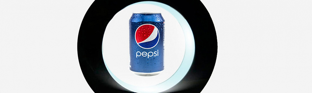 Настольный левитрон в форме кольца вращает баночку Pepsi
